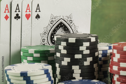 poker game with chips on green background плакат