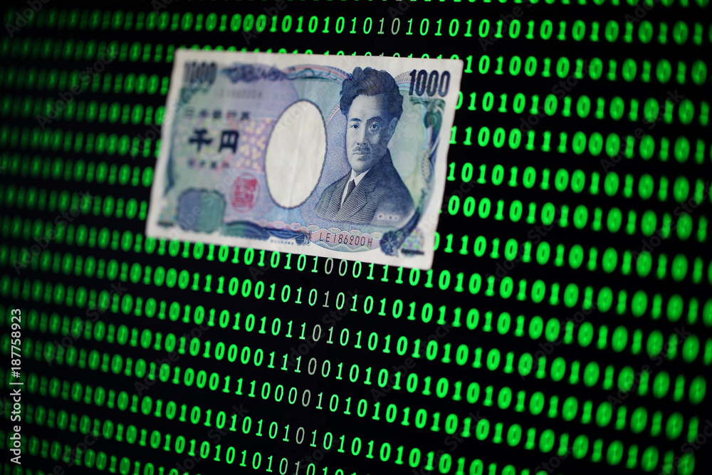 japanese yen banknote among binary code background,cryptocurrency concept.