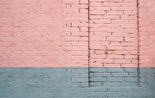 Pink And Gray Painted Brick Wall With A Permanently Closed Door