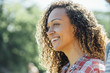© FS Productions/Blend Images - Close up of smiling mixed race woman