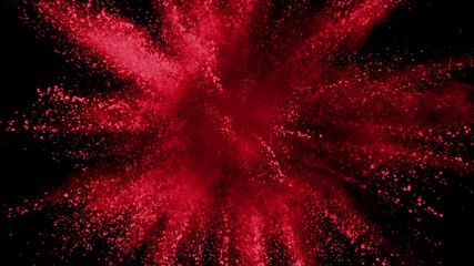 Red powder exploding on black background in super slow motion, shot with Phantom Flex 4K