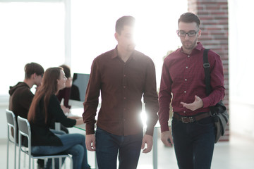 Canvas Print - blurred image of a staff in the office