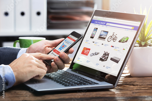 Fotografie, Obraz Businessperson Doing Online Shopping On Smartphone