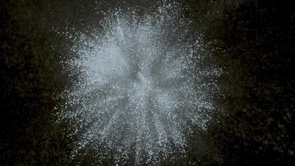 White powder exploding on black background in super slow motion, shot with Phantom Flex 4K