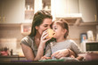 © liderina - Mother and daughter enjoy together . At home kitchen.