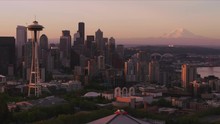 Seattle, Washington Circa-2017, Aerial View Of Seattle At Sunrise With Space Needle And Mt. Rainier.  Shot With Cineflex And RED Epic-W Helium. 