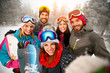 © luckybusiness - Group of friends with ski on winter holidays - Skiers having fun on the snow
