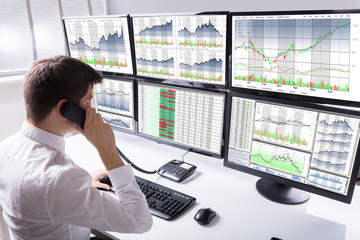 Aufkleber - Close-up Of Stock Broker Talking On Telephone