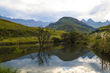 Breathtaking View Of The Mountains And Lake  In Drakensberg, South Africa,