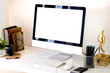 © bongkarn - Mock up  Workspace Desktop Computer : Creative designer desktop with blank white Desktop computer, pencils and stationery items. Blank screen for graphics display montage.