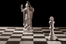 Classic White King And The Same Chess Piece In The Form Of Medieval Figure On The Background