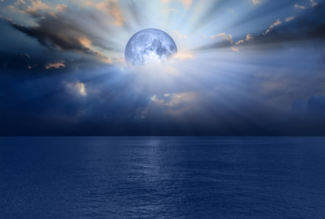 night sky with moon in the clouds 