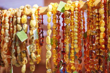 Wall Mural - Amber necklaces sold on Easter fair in Vilnius