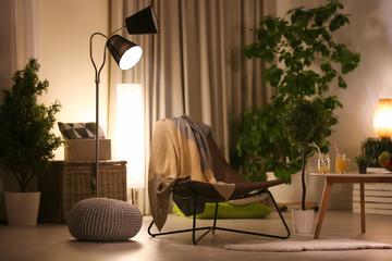 Interior of living room with comfortable armchair