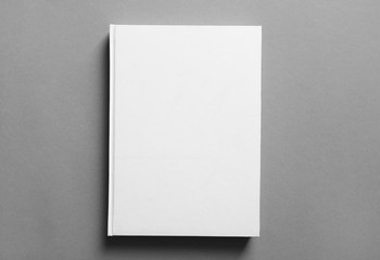 Sticker - Book with blank cover on grey background. Mock up for design