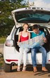 © BillionPhotos.com - Portrait of Young Couple Looking For Directions On the Map