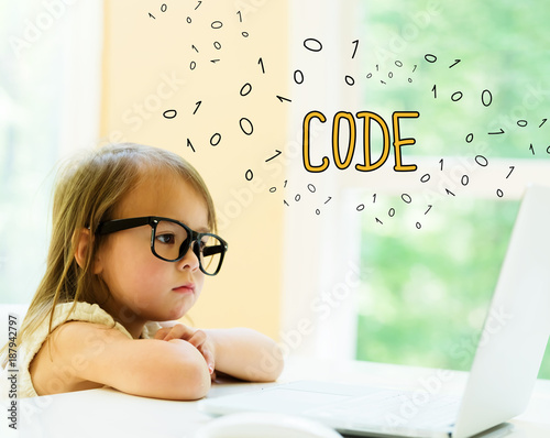 Code text with little girl using her laptop Canvas Print