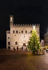 Wall Mural - Gubbio (Italy) - One of the most beautiful medieval towns in Europe, in the heart of the Umbria Region, central Italy. Here in particular the historic center in the night.