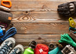 Travel items for hiking over wooden background