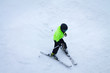 © Galyna Chyzh - Child skiing downhill from the slope