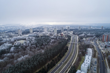 Aerial view over old soviet time architecture in Karoliniskes district, Vilnius, Lithuania. During frosty winter daytime.