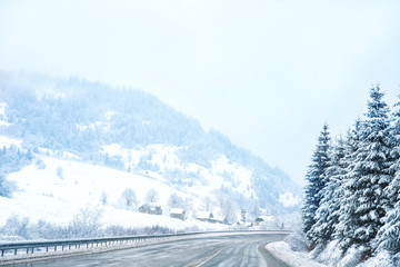 Canvas Print - Country road in snowy winter day