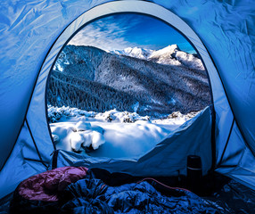 view from tent to the tatra mountains in winter