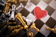 love seduction games strategy concept with red heart with chess board game