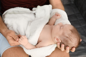 Wall Mural - Father with cute little baby at home, closeup