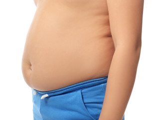 Wall Mural - Overweight boy on white background, closeup