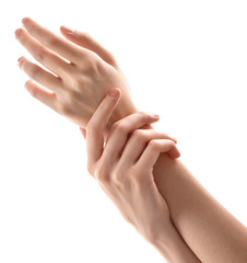 Young woman touching her hand and feeling moisturizing effect of cream on white background