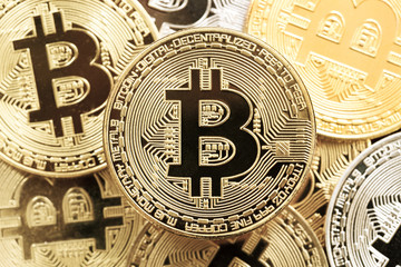 Bitcoin coins background. Art shooting in golden tone