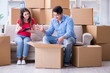 © Elnur - Young pair moving in to new house with boxes