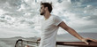 © konradbak - Handsome man relaxing on the ship