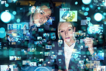 Poster - Young man and woman watching many pictures with stereoscopic vision.