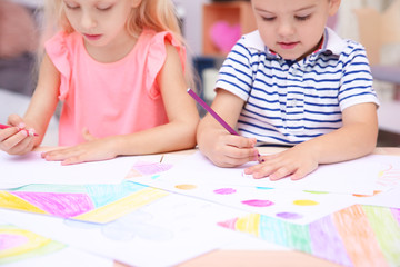 Canvas Print - Cute little children drawing at home