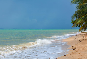 Wall Mural - A tropical storm on Koh Samui in Thailand.