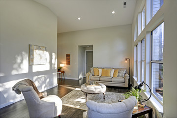 Sun filled family room in soft beige tones.