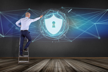 Poster - Businessman in front of a wall with security protection icon on a futuristic interface