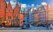 canvas print picture - Wroclaw central market square with old colourful houses, street