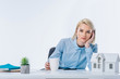 © LIGHTFIELD STUDIOS - portrait of tired real estate agent at workplace