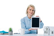 © LIGHTFIELD STUDIOS - portrait of smiling real estate agent showing tablet at workplace isolated on white