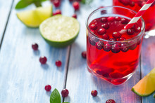 Cranberry Drink On Wooden Surface