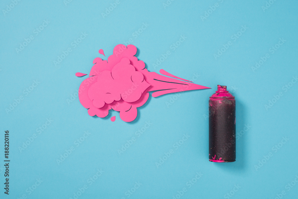 top view of spray paint in can and paper splashes isolated on blue - obrazy, fototapety, plakaty 