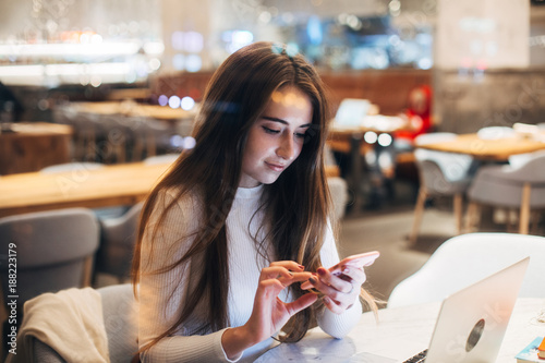 Fotografía Young millennial or hipster new generation digital native woman or student, connects to friends, downloads app or application from internet