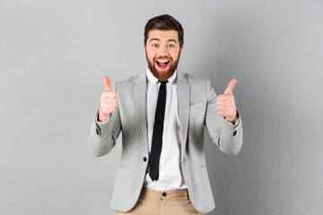 Wall Mural - Portrait of a joyful businessman dressed in suit