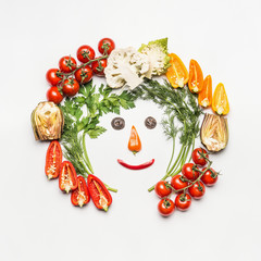 Sticker - Healthy lifestyle concept. Funny face made with various vegetables ingredients on white background, top view, frame. Detox, dieting and clean eating food