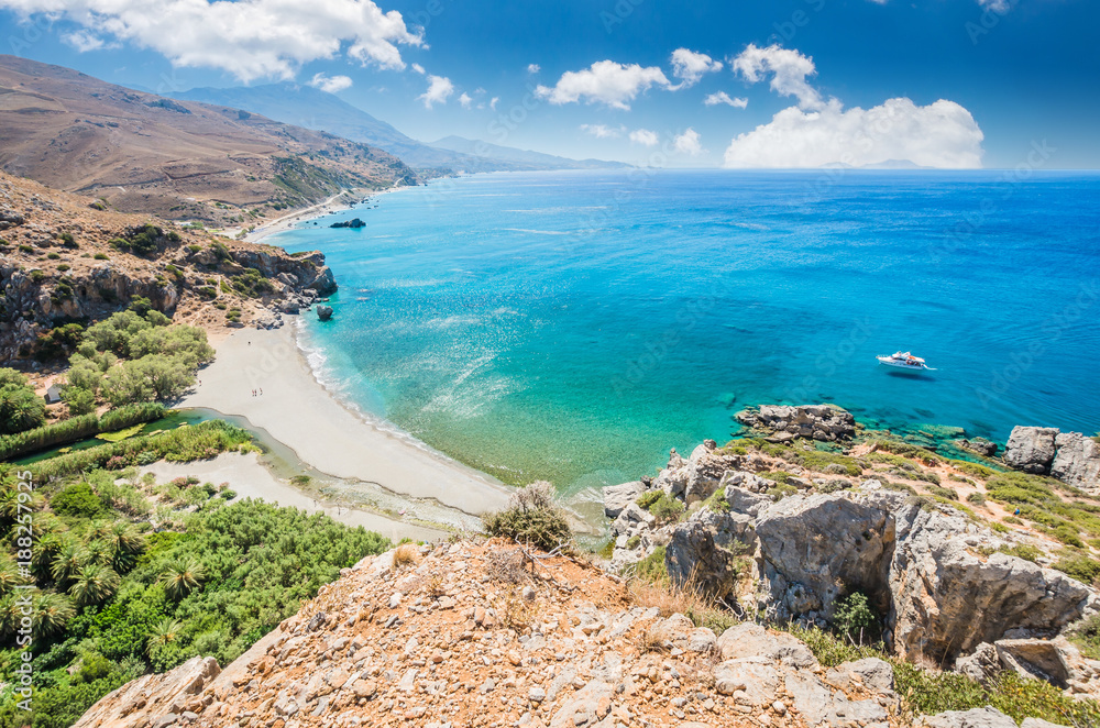 Obraz na płótnie Preveli Beach in Crete island, Greece. There is a palm forest and a river inside the gorge near this beach. w salonie