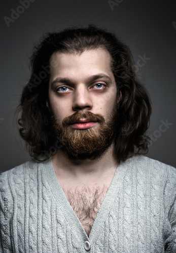 Portrait Of A Handsome Man With A Beard Long Hair And Big