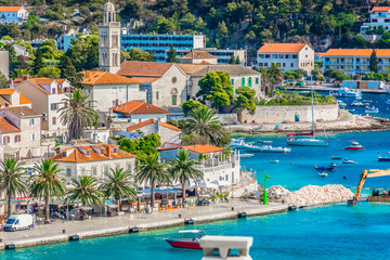 Wall Mural - Hvar coastal town above. / Aerial view at coastal town Hvar in Southern Croatia, popular travel resort in Mediterranean, Europe.